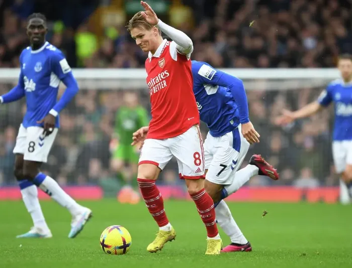 Framed Print : Odegaard vs McNeil: A Premier League Showdown at Goodison Park Framed Print : Odegaard vs McNeil: A Premier League Showdown at Goodison Park