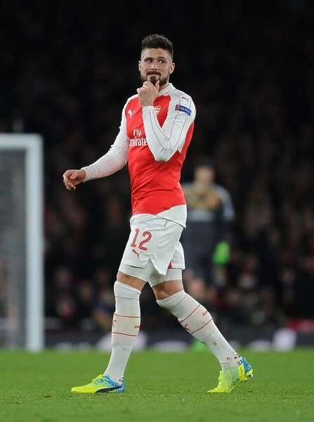 Olivier Giroud in Action: Arsenal FC vs. FC Barcelona - UEFA Champions League Round of 16, First Leg
