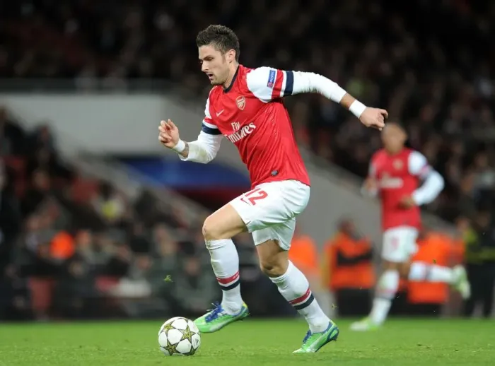 Framed Print : Olivier Giroud in Action for Arsenal against Montpellier in 2012-13 UEFA Champions League