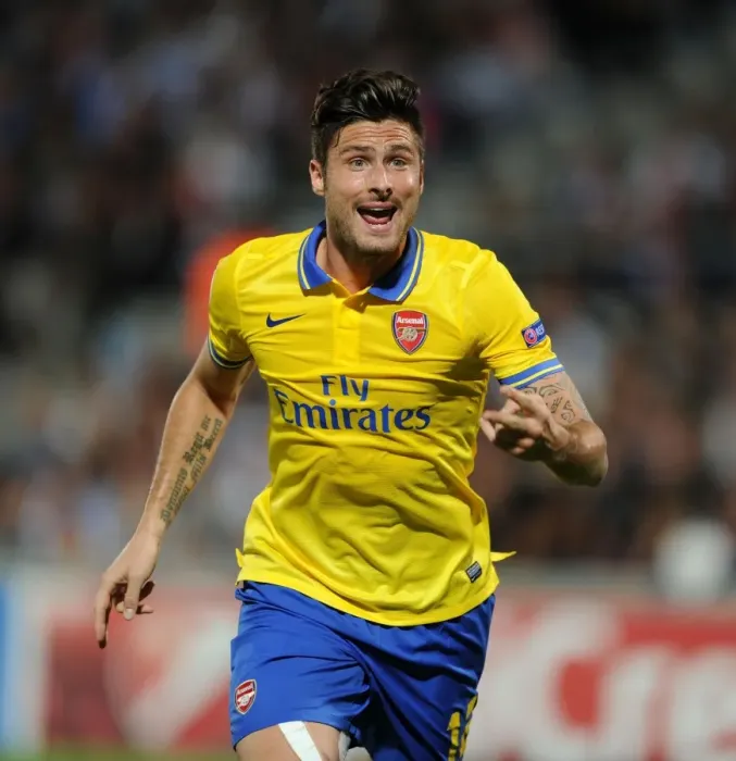Framed Print : Olivier Giroud: In Action for Arsenal against Olympique Marseille (2013-14 Champions League) Framed Print : Olivier Giroud: In Action for Arsenal against Olympique Marseille (2013-14 Champions League)