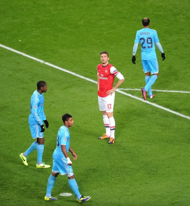 Framed Print : Olivier Giroud in Action: Arsenal vs. Olympique de Marseille, UEFA Champions League (2013) Framed Print : Olivier Giroud in Action: Arsenal vs. Olympique de Marseille, UEFA Champions League (2013)