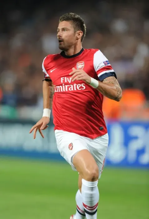 Framed Print : Olivier Giroud in Action: Montpellier vs Arsenal, UEFA Champions League 2012-13
