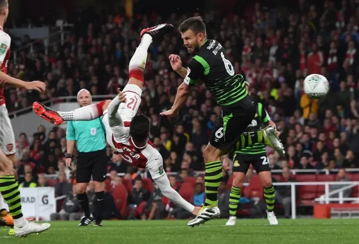 Framed Print : Olivier Giroud (Arsenal) Andy Butler (Doncaster). Arsenal 1: 0 Doncaster. The Carabao Cup Framed Print : Olivier Giroud (Arsenal) Andy Butler (Doncaster). Arsenal 1: 0 Doncaster. The Carabao Cup