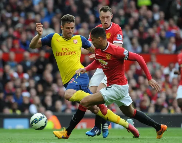 Framed Print : Olivier Giroud (Arsenal) Chris Smalling and Phil Jones (Man Utd). Manchester United 1: 1 Arsenal Framed Print : Olivier Giroud (Arsenal) Chris Smalling and Phil Jones (Man Utd). Manchester United 1: 1 Arsenal