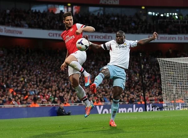 Olivier Giroud (Arsenal) Guy Demel (West Ham). Arsenal 3:1 West Ham United. Barclays Premier League