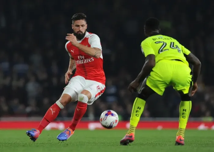 Framed Print : Olivier Giroud (Arsenal) Tyler Blackett (Reading). Arsenal 2: 0 Reading. EFL Cup 4th Round