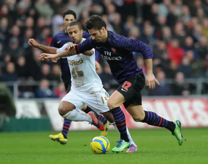 Framed Print : Olivier Giroud (Arsenal) Wayne Routledge (Swansea). Swansea 2: 2 Arsenal. FA Cup 3rd Round Framed Print : Olivier Giroud (Arsenal) Wayne Routledge (Swansea). Swansea 2: 2 Arsenal. FA Cup 3rd Round