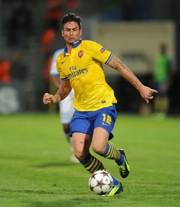 Framed Print : Olivier Giroud: Arsenal's Champion Striker Shines in UEFA Champions League Clash against Olympique Marseille (2013-14) Framed Print : Olivier Giroud: Arsenal's Champion Striker Shines in UEFA Champions League Clash against Olympique Marseille (2013-14)