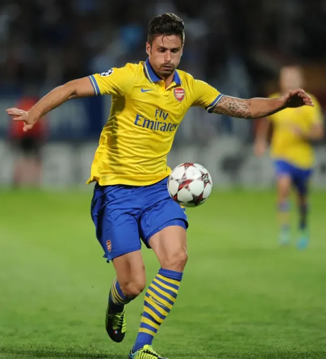 Framed Print : Olivier Giroud: Arsenal's Star Striker in Action against Olympique Marseille (2013-14) Framed Print : Olivier Giroud: Arsenal's Star Striker in Action against Olympique Marseille (2013-14)