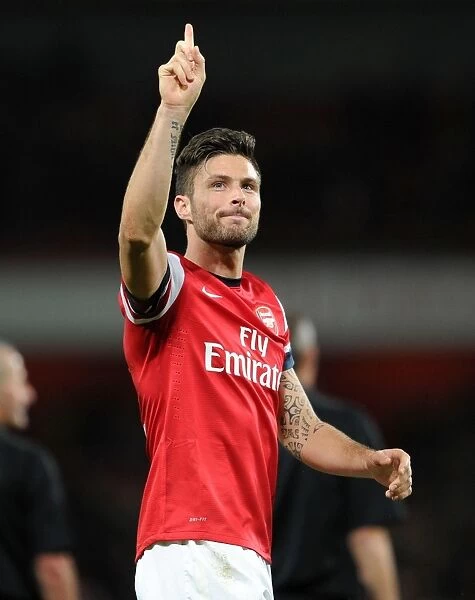 Olivier Giroud Celebrates Arsenal's Victory over Liverpool in the Premier League, 2013