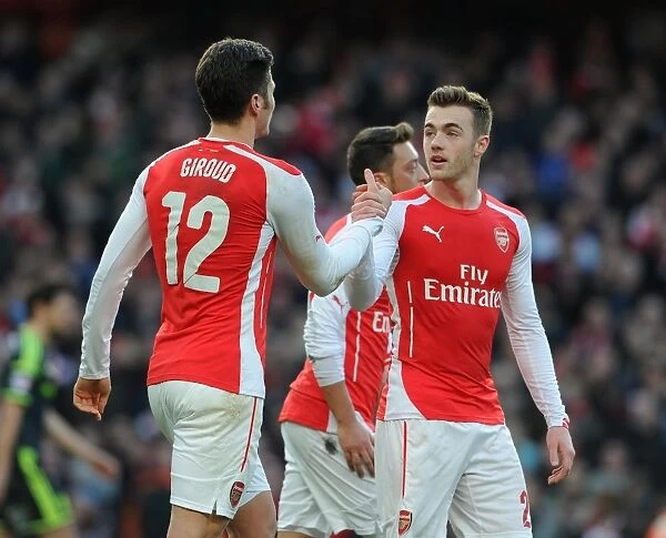 Olivier Giroud celebrates scoring his and Arsenals 1st goal with Calum Chambers
