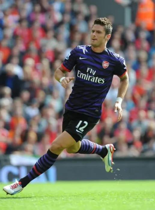 Framed Print : Olivier Giroud Faces Liverpool: Premier League Showdown (2012-13) Framed Print : Olivier Giroud Faces Liverpool: Premier League Showdown (2012-13)