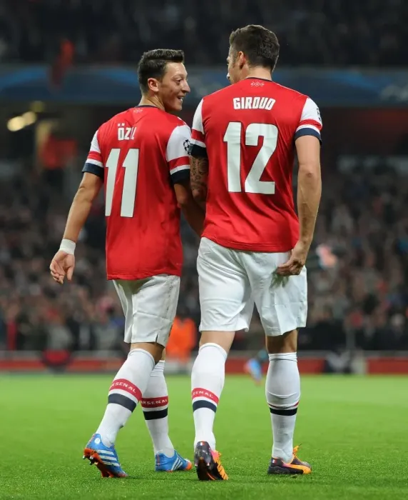 Framed Print : Olivier Giroud and Mesut Ozil Celebrate Arsenal's Second Goal vs. Napoli (2013-14)
