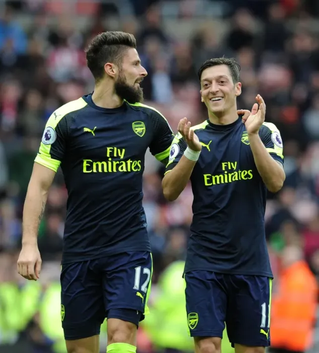 Framed Print : Olivier Giroud and Mesut Ozil's Celebration: Arsenal's Dominance over Sunderland (2016-17)