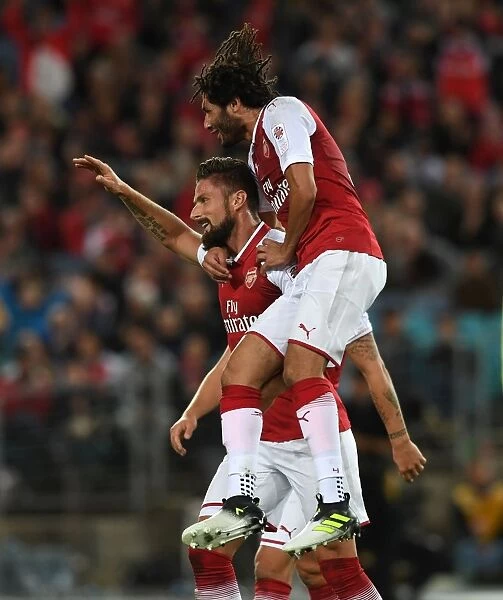 Olivier Giroud and Mohamed Elneny Celebrate Arsenal's First Goal Against Sydney Western Wanderers