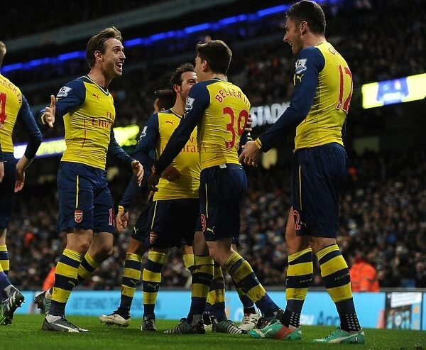 Olivier Giroud and Nacho Monreal Celebrate Arsenal's Goals Against Manchester City (2014-15)