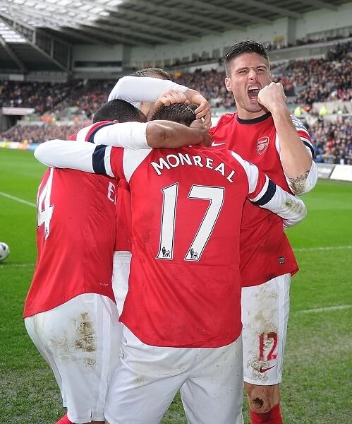 Olivier Giroud and Nacho Monreal Celebrate Arsenal's Goal Against Swansea City