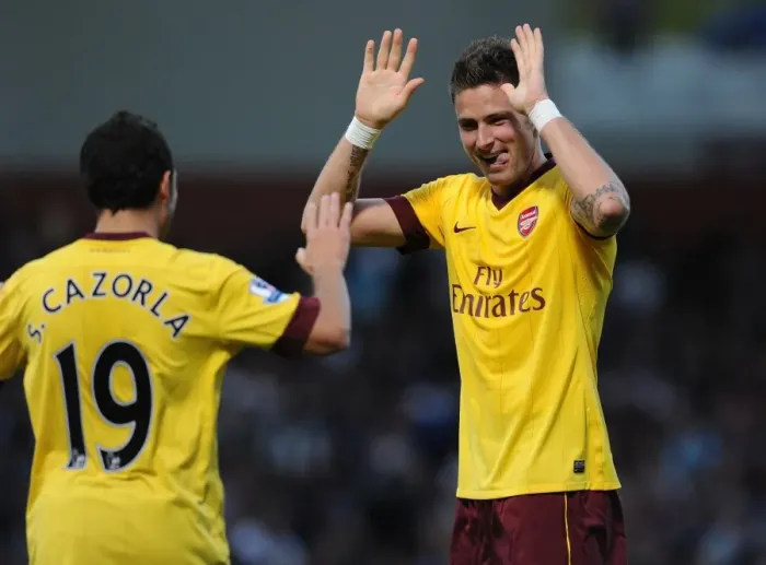 Framed Print : Olivier Giroud and Santi Cazorla Celebrate Arsenal's First Goal Against West Ham United (2012-13)