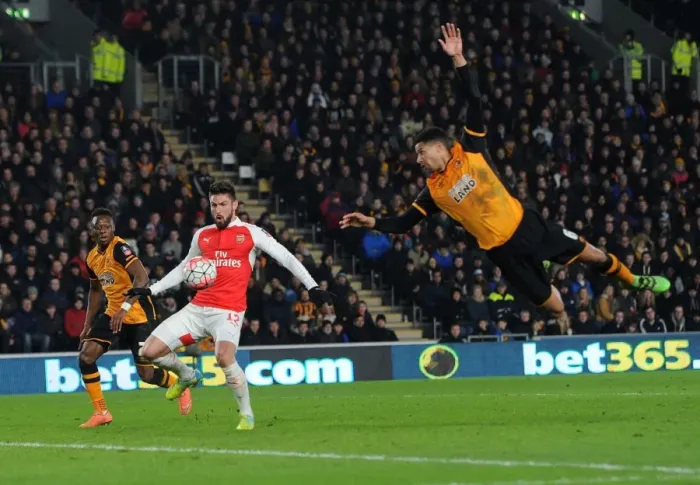 Framed Print : Olivier Giroud Scores Against Hull: FA Cup Fifth Round Replay - Giroud Splits Moses Odubajo and Curtis Davies Framed Print : Olivier Giroud Scores Against Hull: FA Cup Fifth Round Replay - Giroud Splits Moses Odubajo and Curtis Davies