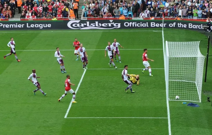 Framed Print : Olivier Giroud Scores the Winning Goal Past Brad Guzan: Arsenal vs. Aston Villa, Premier League 2013-14