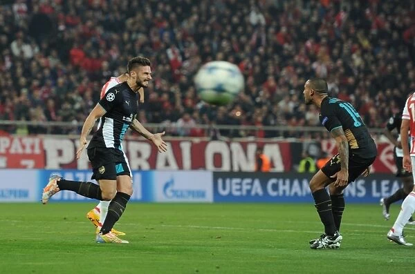 Olivier Giroud and Theo Walcott's Euphoric Moment: Celebrating Goals Against Olympiacos in the 2015-16 UEFA Champions League