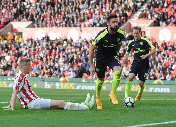 Olivier Giroud's Brace: Arsenal's Triumph over Stoke City (May 2017) - Giroud Celebrates as Shawcross Disappointed