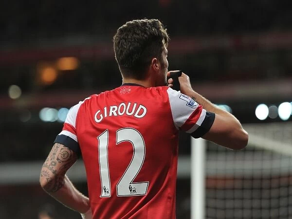 Olivier Giroud's Double: Thrilling Arsenal Victory Over West Ham United in the Premier League (April 2014)