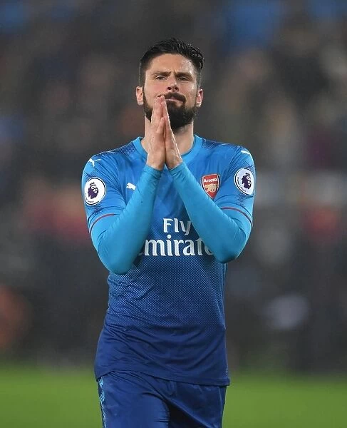 Olivier Giroud's Euphoric Moment with Arsenal Fans: Swansea Victory Celebration
