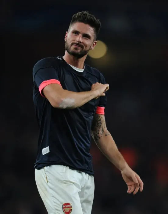 Framed Print : Olivier Giroud's Euphoric Moment: Arsenal's Stunner Against Bayern Munich in the Champions League