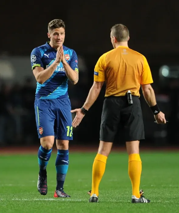 Framed Print : Olivier Giroud's Plea to Referee Svein Oddvar Moen during Monaco vs Arsenal UCL Clash