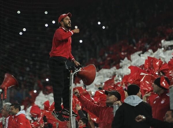 Olympiacos Fan's Excitement: Olympiacos vs. Arsenal, UEFA Champions League, Piraeus, Greece (December 2015)