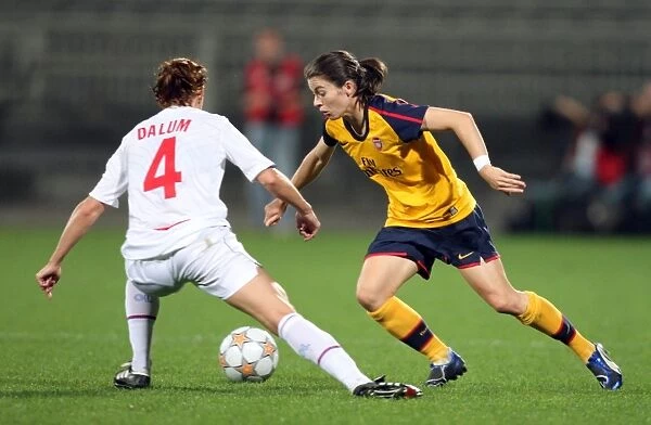 Olympic Lyon Dominates Arsenal Ladies in UEFA Cup: Karen Carney and Jensen Dorte Dalum Face Off