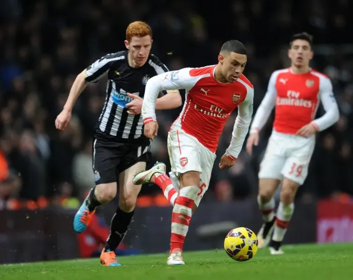 Framed Print : Oxlade-Chamberlain vs. Colback: A Fight for Supremacy in the Arsenal vs. Newcastle United Clash Framed Print : Oxlade-Chamberlain vs. Colback: A Fight for Supremacy in the Arsenal vs. Newcastle United Clash