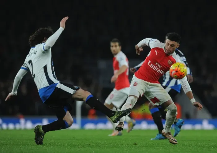 Framed Print : Oxlade-Chamberlain vs. Coloccini: A Football Rivalry at the Emirates Stadium Framed Print : Oxlade-Chamberlain vs. Coloccini: A Football Rivalry at the Emirates Stadium