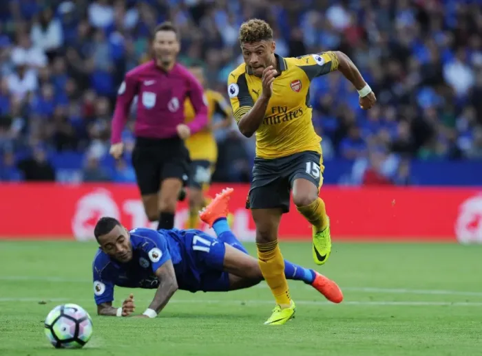 Framed Print : Oxlade-Chamberlain vs. Simpson: Intense Clash in Arsenal's Premier League Battle with Leicester (2016-17) Framed Print : Oxlade-Chamberlain vs. Simpson: Intense Clash in Arsenal's Premier League Battle with Leicester (2016-17)