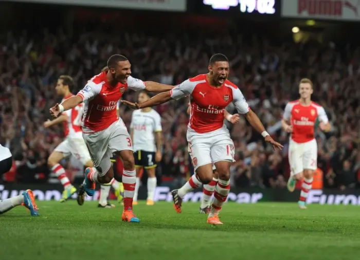 Framed Print : Oxlade-Chamberlain's Last-Minute Thriller: Arsenal Edges Past Tottenham in Intense 2014-15 Premier League Clash Framed Print : Oxlade-Chamberlain's Last-Minute Thriller: Arsenal Edges Past Tottenham in Intense 2014-15 Premier League Clash