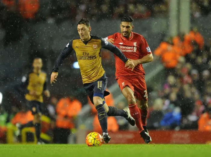 Framed Print : Ozil vs. Can: Intense Rivalry in the Premier League Showdown between Liverpool and Arsenal (2015-16)
