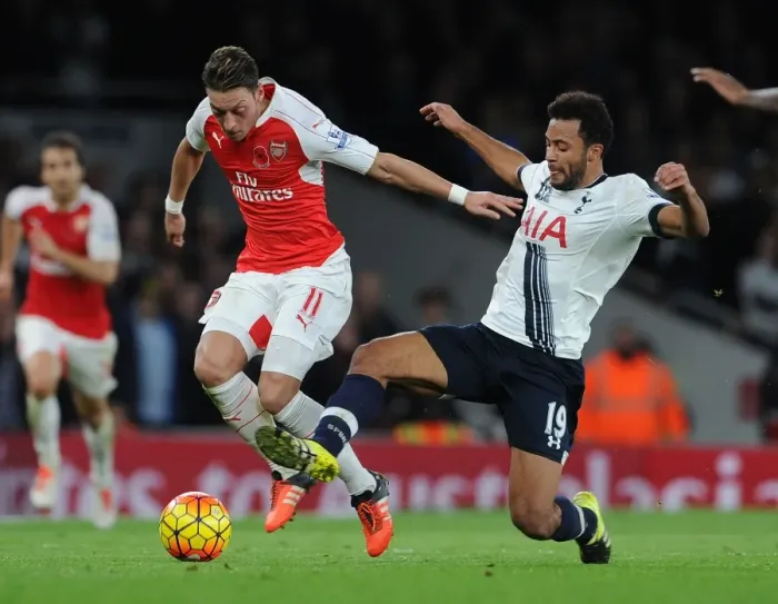 Framed Print : Ozil vs. Dembele: An Intense Battle in the 2015-16 Premier League - Arsenal vs. Tottenham Framed Print : Ozil vs. Dembele: An Intense Battle in the 2015-16 Premier League - Arsenal vs. Tottenham