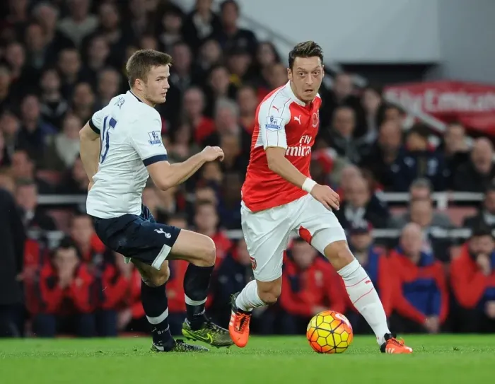 Framed Print : Ozil vs. Dier: Intense Rivalry Unfolds - Arsenal vs. Tottenham (2015-16)