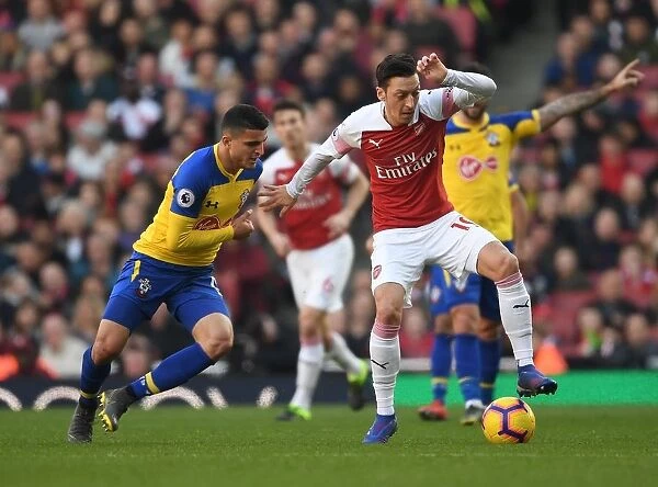 Ozil vs. Elyounoussi: A Battle of Skills in Arsenal vs. Southampton Premier League Clash