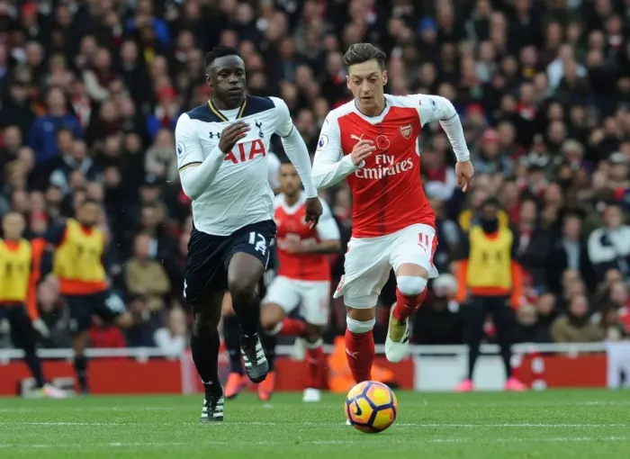Framed Print : Ozil vs. Wanyama: A Footballing Battle in the Arsenal vs. Tottenham Rivalry (2016-17)