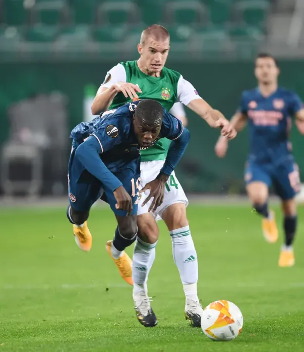 Framed Print : Partey Foul: Intense Clash Between Rapid Vienna and Arsenal FC in Europa League Framed Print : Partey Foul: Intense Clash Between Rapid Vienna and Arsenal FC in Europa League