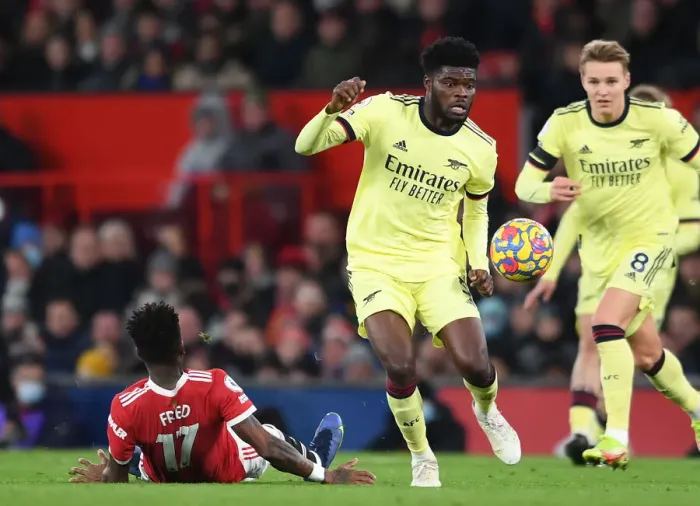 Framed Print : Partey vs Fred: Intense Battle in Manchester United vs Arsenal Premier League Clash Framed Print : Partey vs Fred: Intense Battle in Manchester United vs Arsenal Premier League Clash