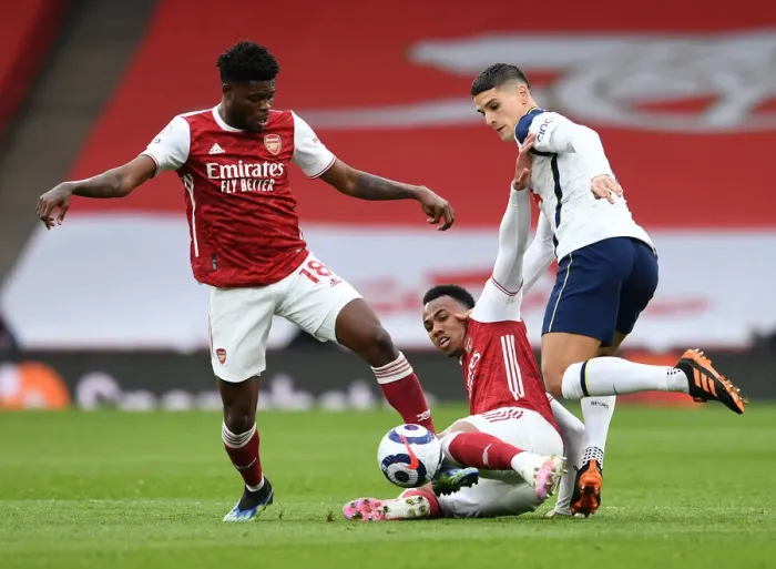 Framed Print : Partey vs. Lamela: A Battle of Intense Rivalry in the Arsenal vs. Tottenham Clash