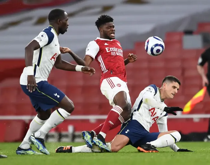 Framed Print : Partey vs. Lamela: A Fierce Battle in the Arsenal vs. Tottenham Premier League Clash