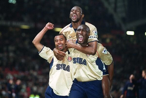 Patrick Vieira, Ashley Cole and Sol Campbell celebrate the Arsenal Championship victory after the ma