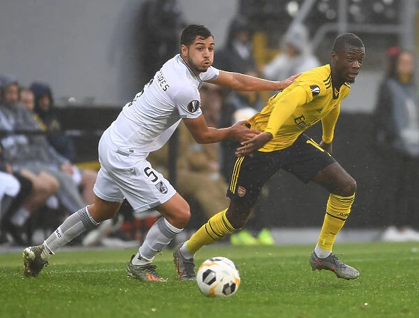 Pepe Clashes with Tapsoba: Vitoria Guimaraes vs. Arsenal, UEFA Europa League, Group F