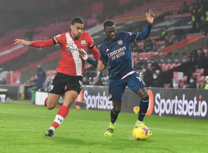 Framed Print : Pepe Holds Off Valery: Southampton vs. Arsenal, Premier League 2021 (Behind Closed Doors)