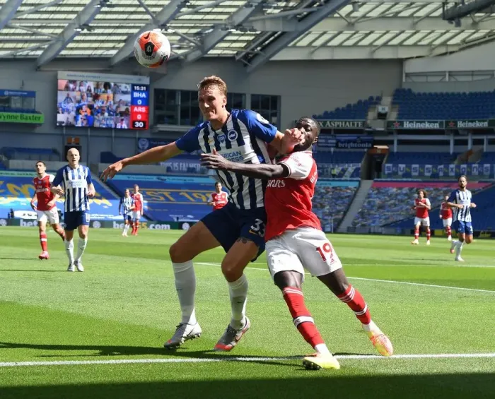 Framed Print : Pepe vs. Burn: Empty Stadium Showdown - Premier League Battle in Brighton (2019-20) Framed Print : Pepe vs. Burn: Empty Stadium Showdown - Premier League Battle in Brighton (2019-20)