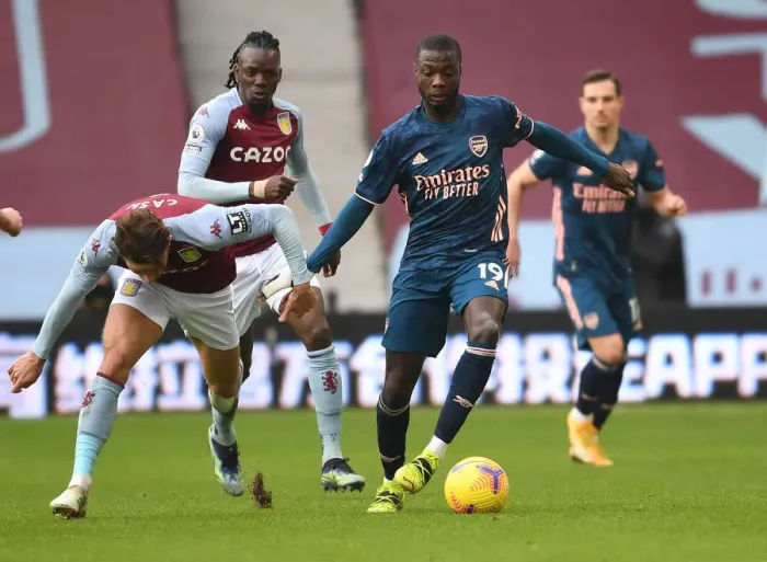 Framed Print : Pepe vs. Cash: A Premier League Showdown in Empty Villa Park Amidst the Pandemic Framed Print : Pepe vs. Cash: A Premier League Showdown in Empty Villa Park Amidst the Pandemic